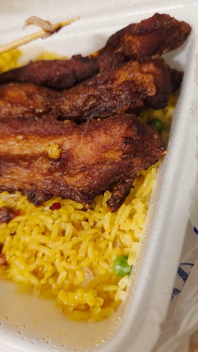 China Lite Restaurant - A Video Clip of the Chicken on a Stick on top of the Pork Fried Rice that was plumpy, juicy, and delicious! - Chinese Near Me - Roanoke, Virginia