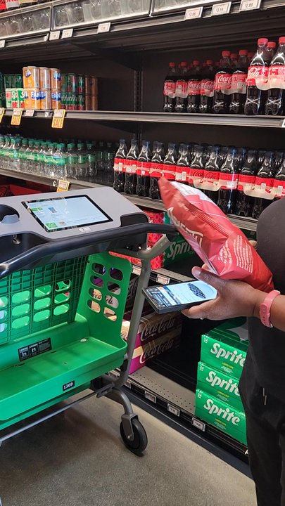 Amazon Fresh - Mom giving her first item a scan....Notice how the basket senses it... - Grocery Near Me - Los Angeles, California