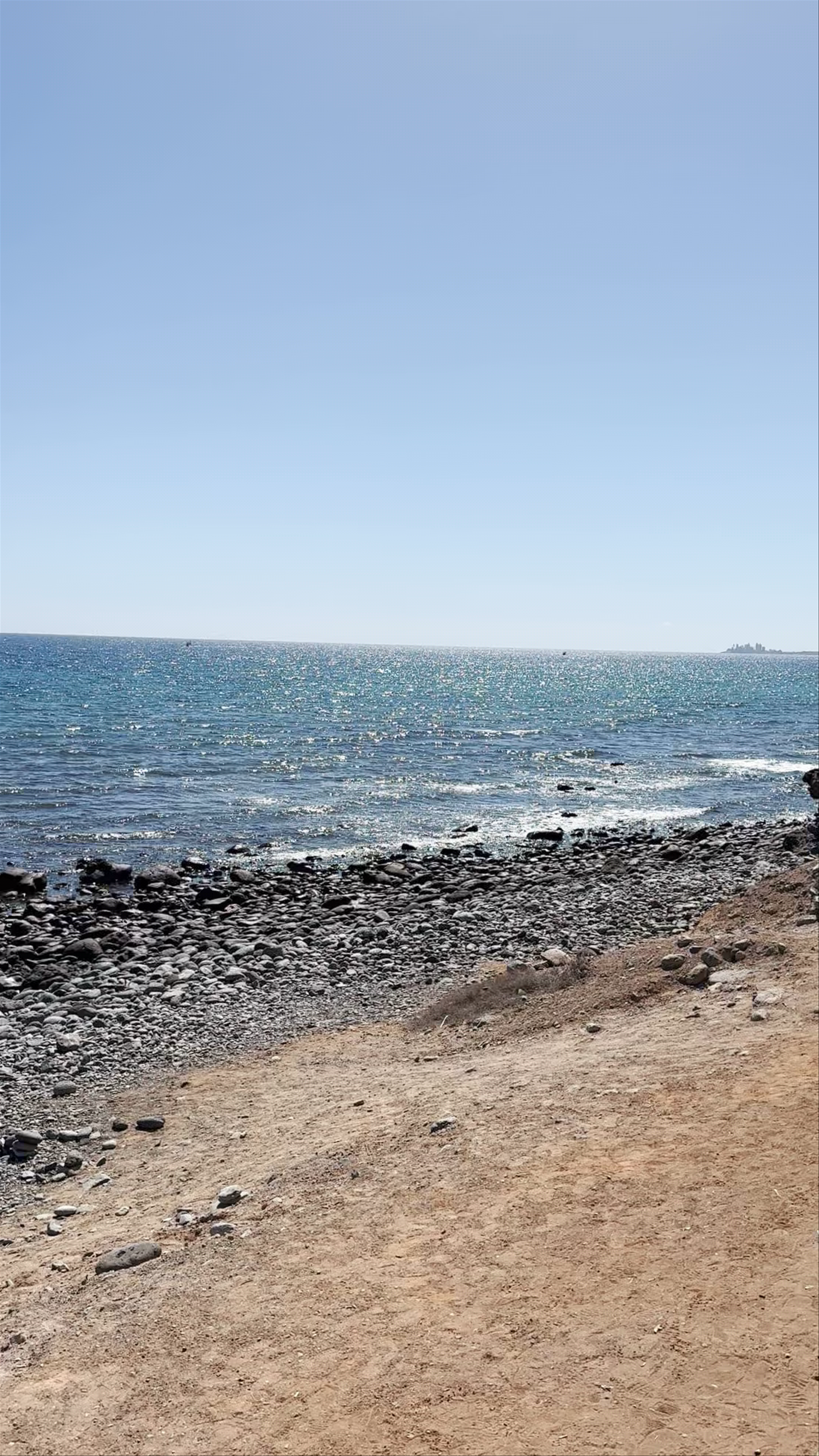 Playa Del Faro: Tranquil Coastal Escape in Maspalomas, Spain