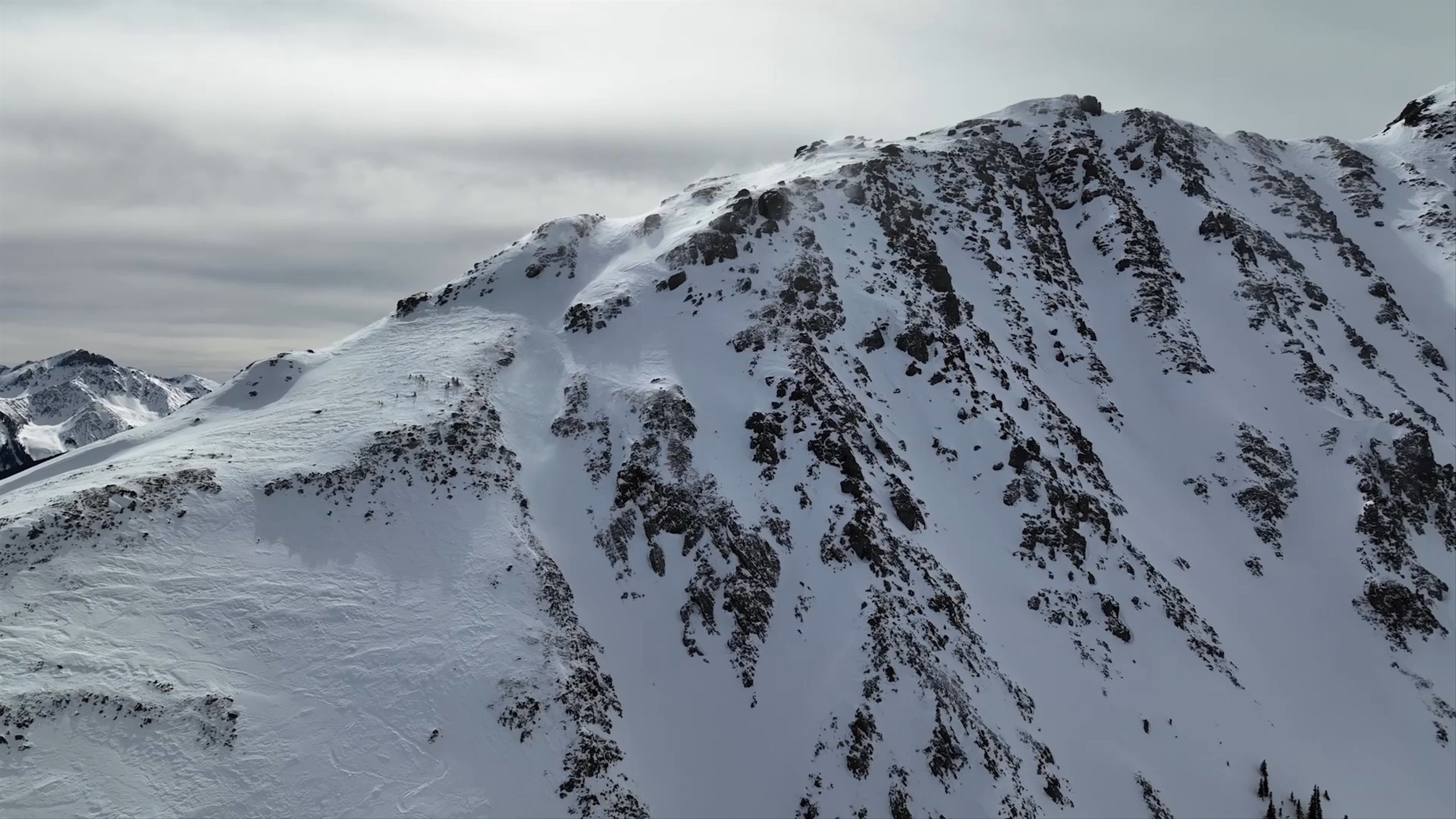 Montage video of skiers and scenic views of Silverton Mountain