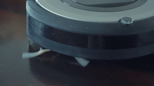 A robot vacuum cleaner in action