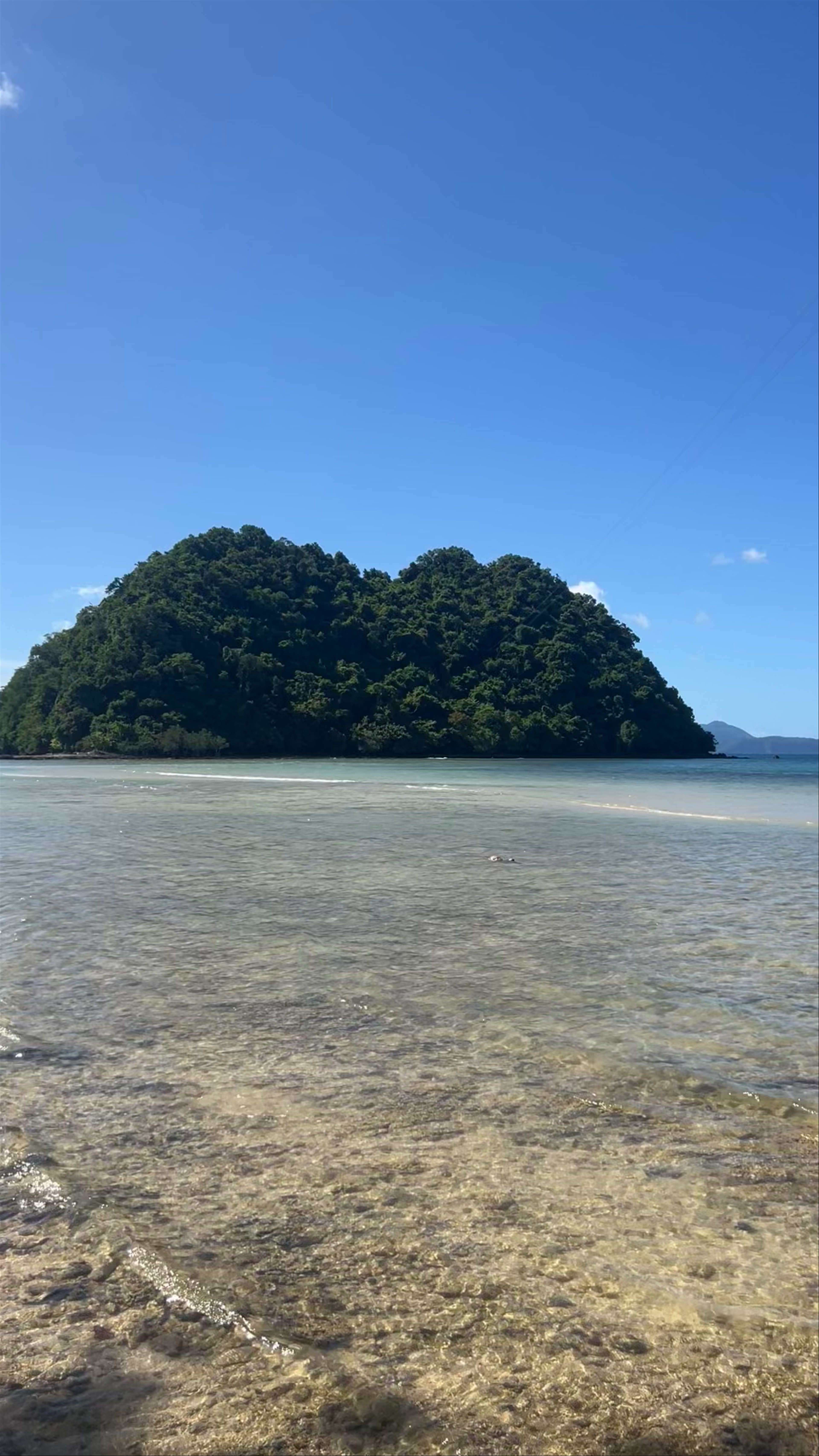 Las Cabañas Beach Bliss: Sunlit Shores of El Nido, Philippines