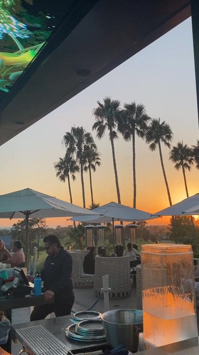 Edge Bar - Video at bar showing sunset and ceiling - Cocktail Bars Near Me - Newport Beach, California