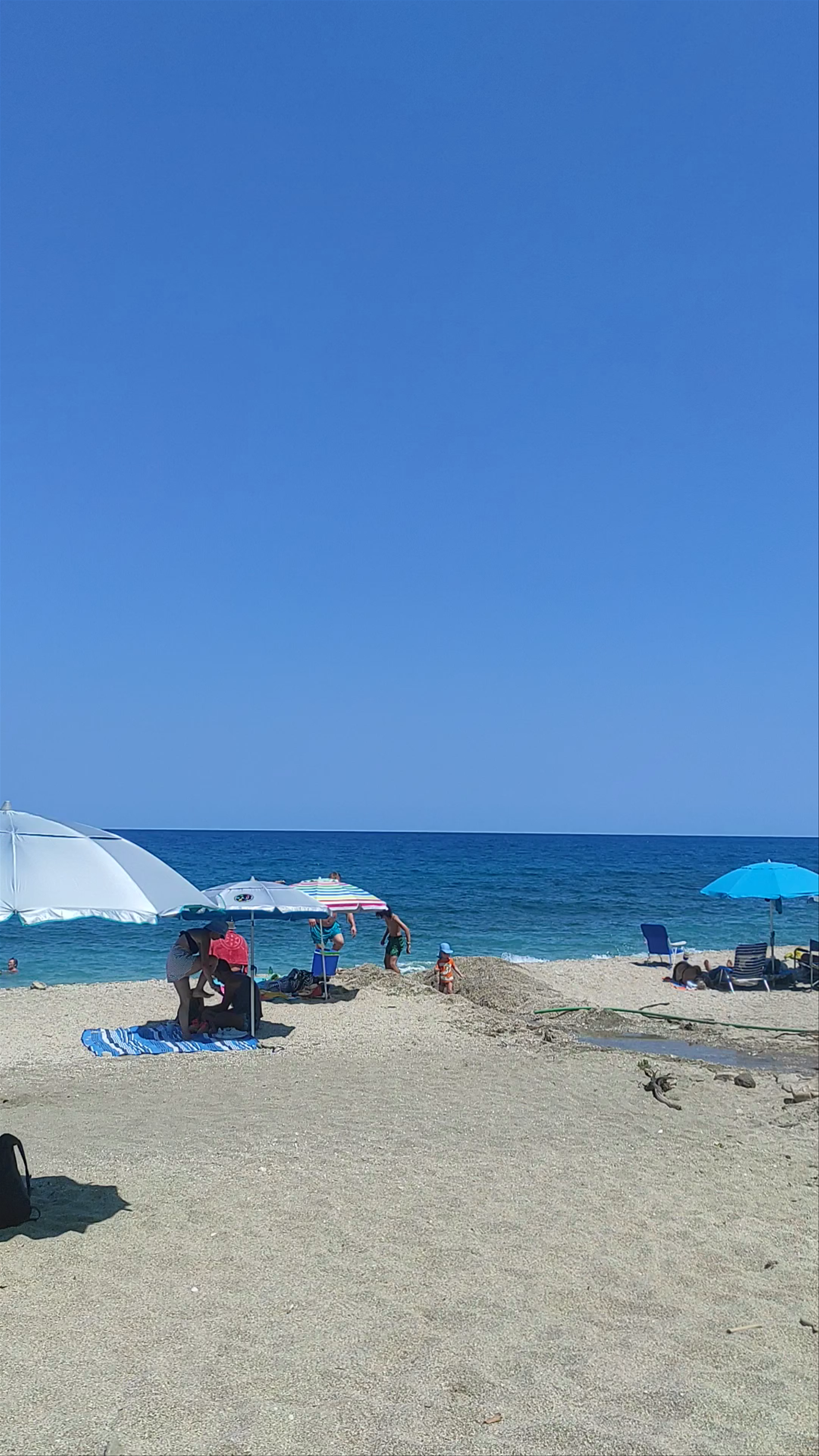Sun-Kissed Serenity at Agios Ioannis Beach, Chios, Greece