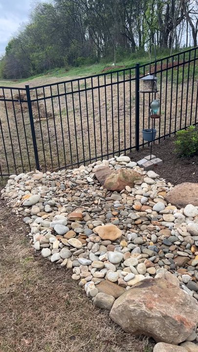 Pearson Solutions - Landscaping, dry river creek bed, and mulch with plants - Landscaping Near Me