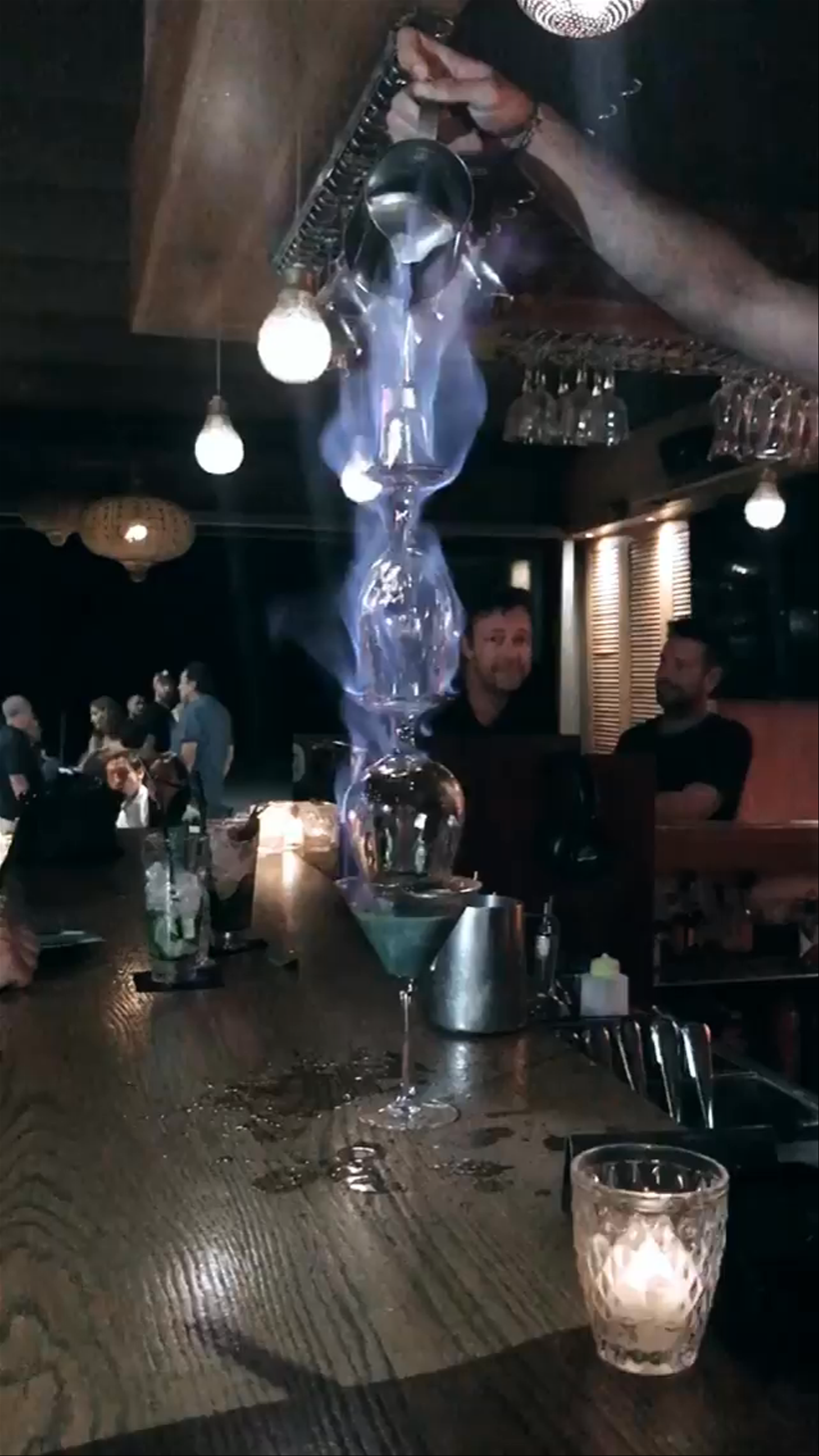 Flaming Cocktail Artistry at Carnaval Jávea Bar