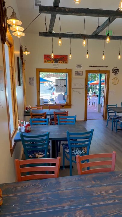 Brunch Broth & Bloom - Inside large dining room. Hallway leads to small dining room, merch area, and bathrooms - American Near Me - Prescott, Arizona
