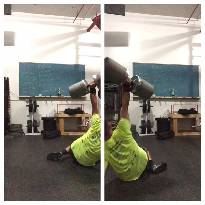 Proving Grounds Strength And Konditioning - Turkish Get Ups with mini Circus dumbbell. - Gyms Near Me - Detroit, Michigan