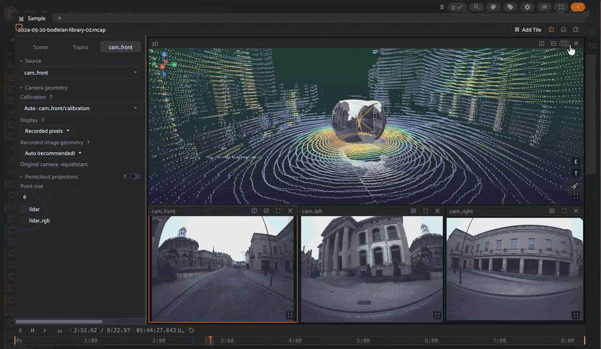 FiftyOne multimodal viewer playing an Oxford Spires MCAP episode, with RGB-colorized LiDAR of the Bodleian Library and three fisheye camera frustums in the 3D tile.