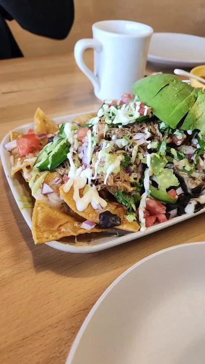 SeD Cocina - DELICIOUS nachos. Nice crispy fried Tortilla chips, carnitas were not dry at all and the salsa on top was really good. - Mexican Near Me - Montclair, California