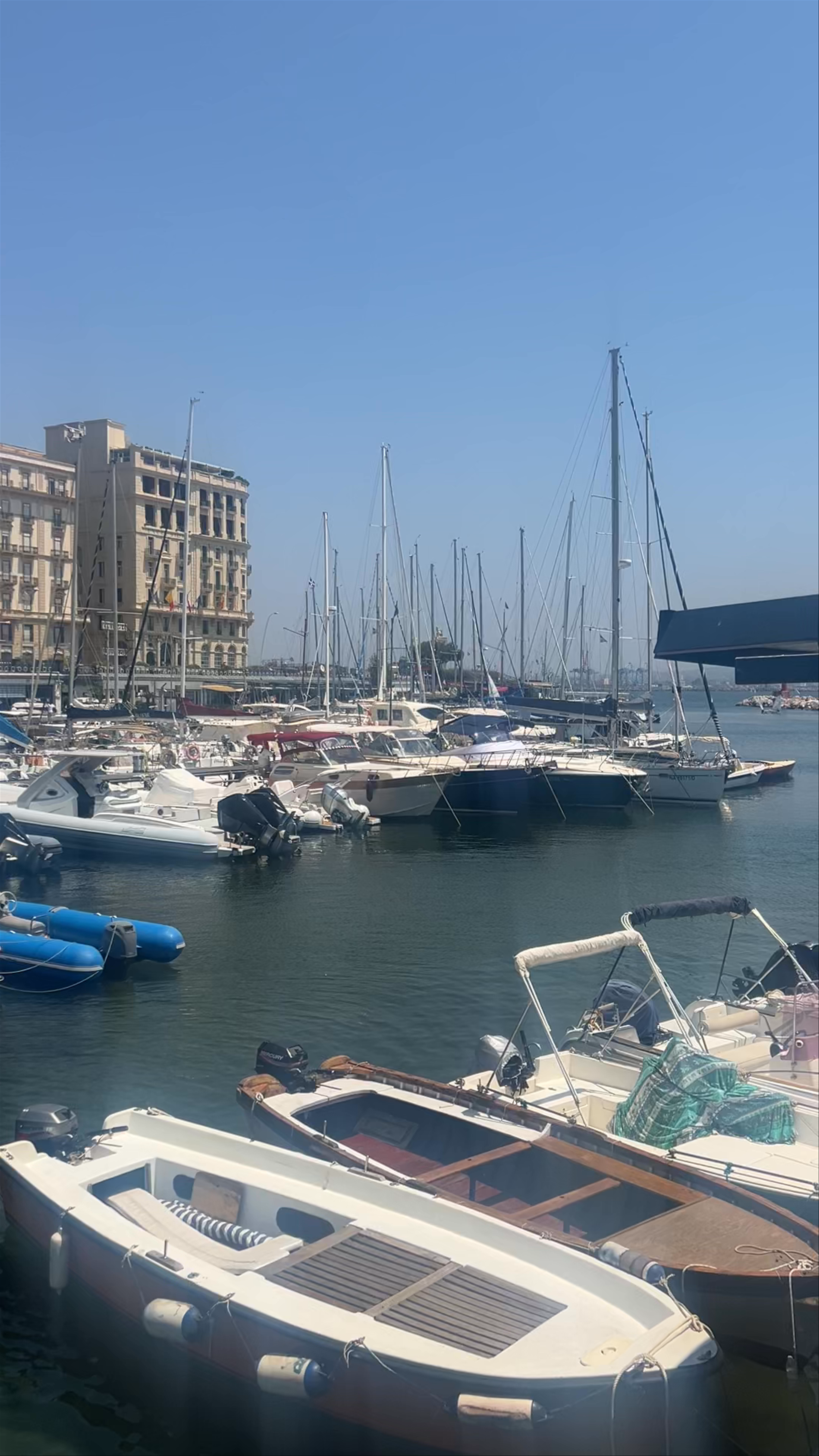 Sunlit Waterfront and Historic Castel dell'Ovo in Naples, Italy