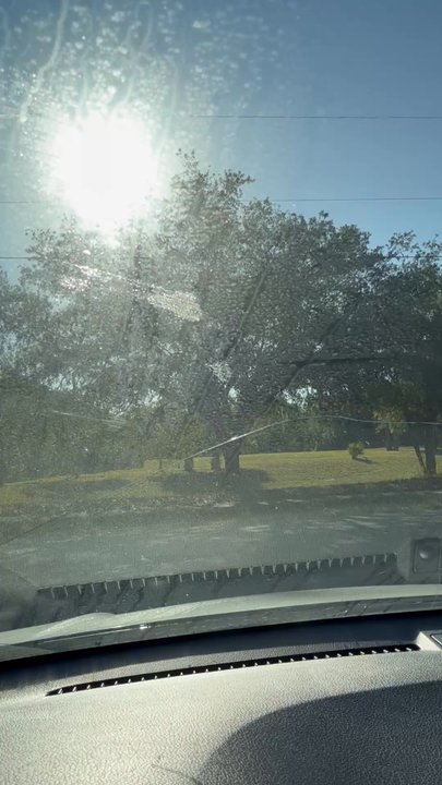 EAS Detailing - Proving it's not the outside of the window dirty - Auto Detailing Near Me - Titusville, Florida