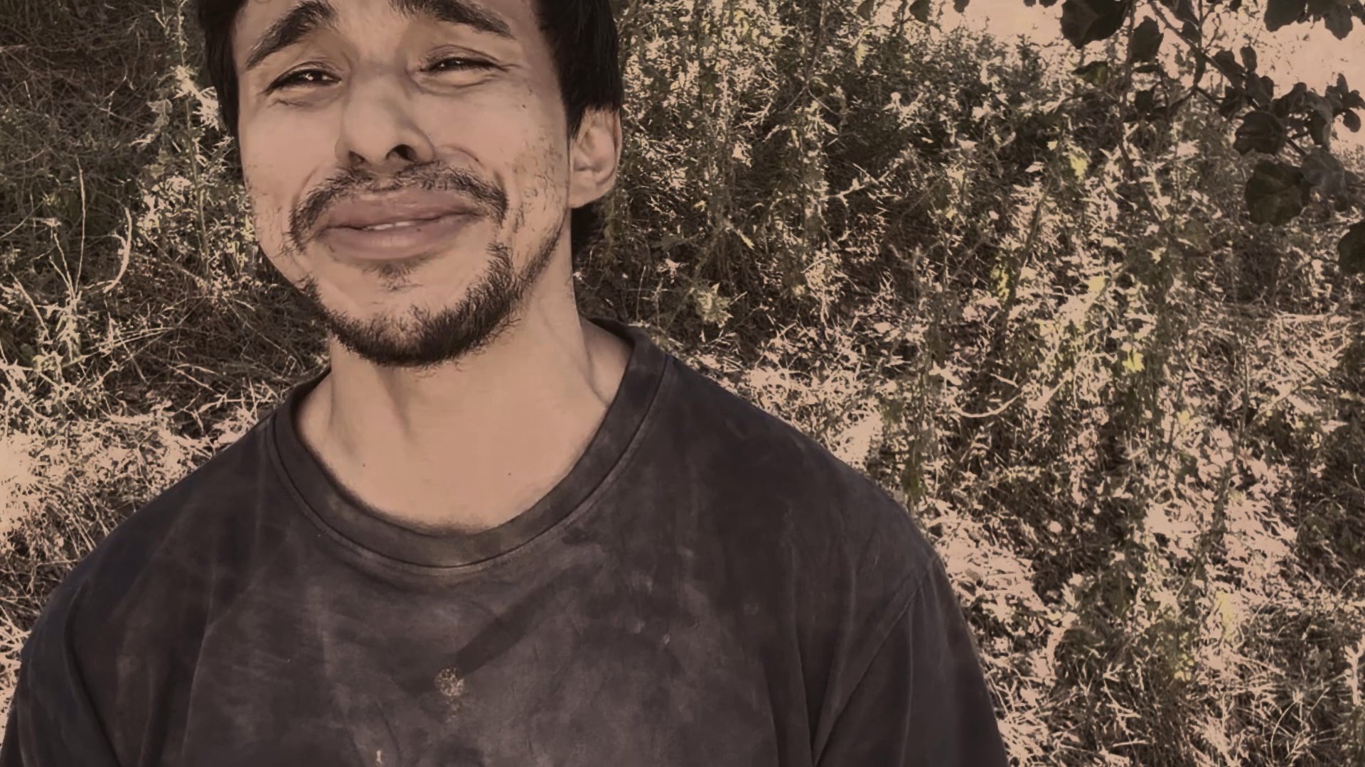 A man exhibits visible signs of distress and grief before transitioning into a somber, intimate state of reflection. The sequence captures a raw emotional progression through shifting facial expressions and body language.