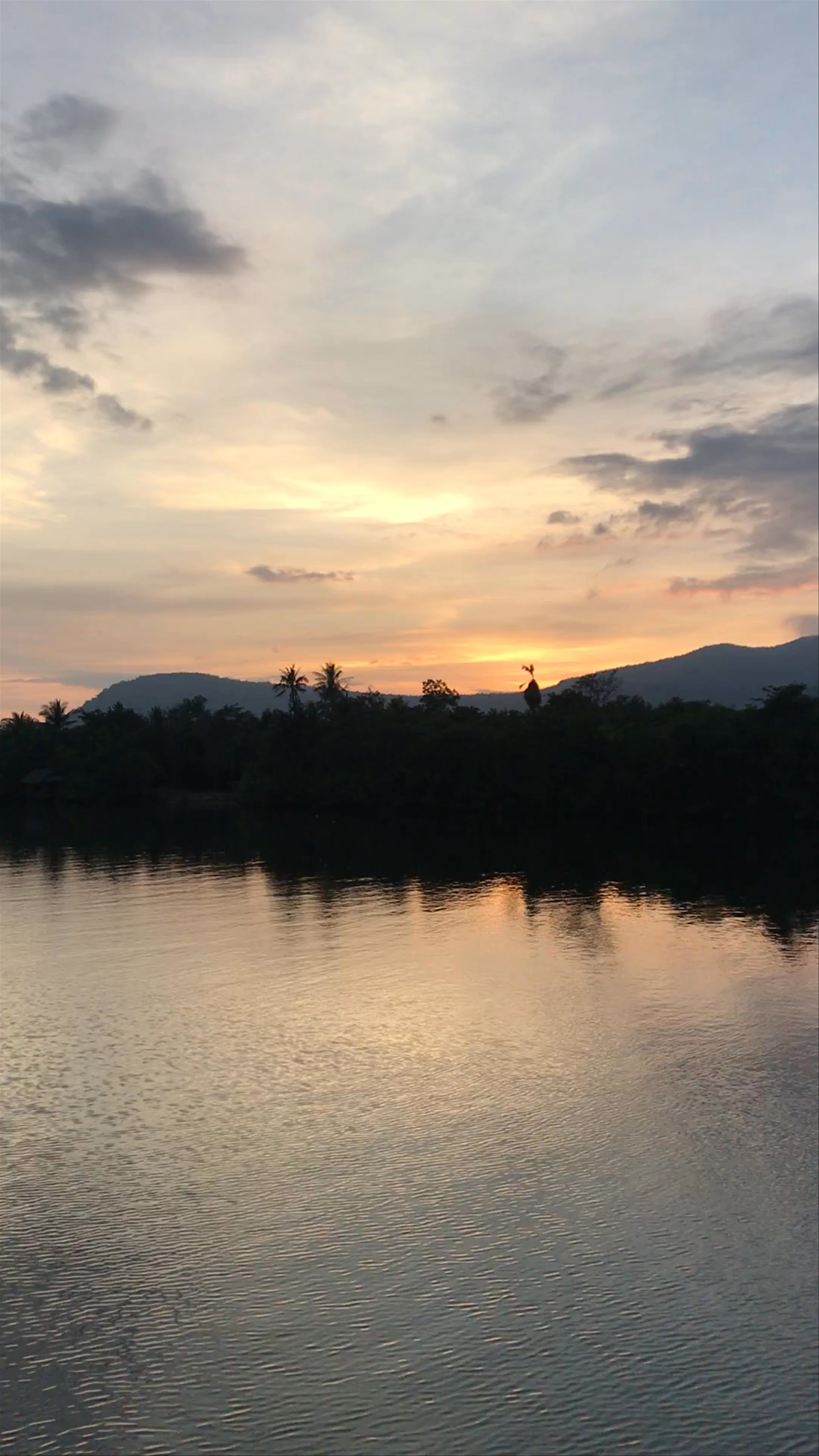 Serene Kayak Journey at Sunset in Kampot, Cambodia
