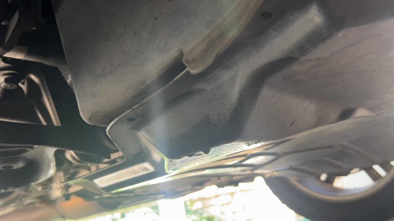 Firestone Complete Auto Care - Loose oil pan not attached properly. - Tires Near Me - Covington, Kentucky