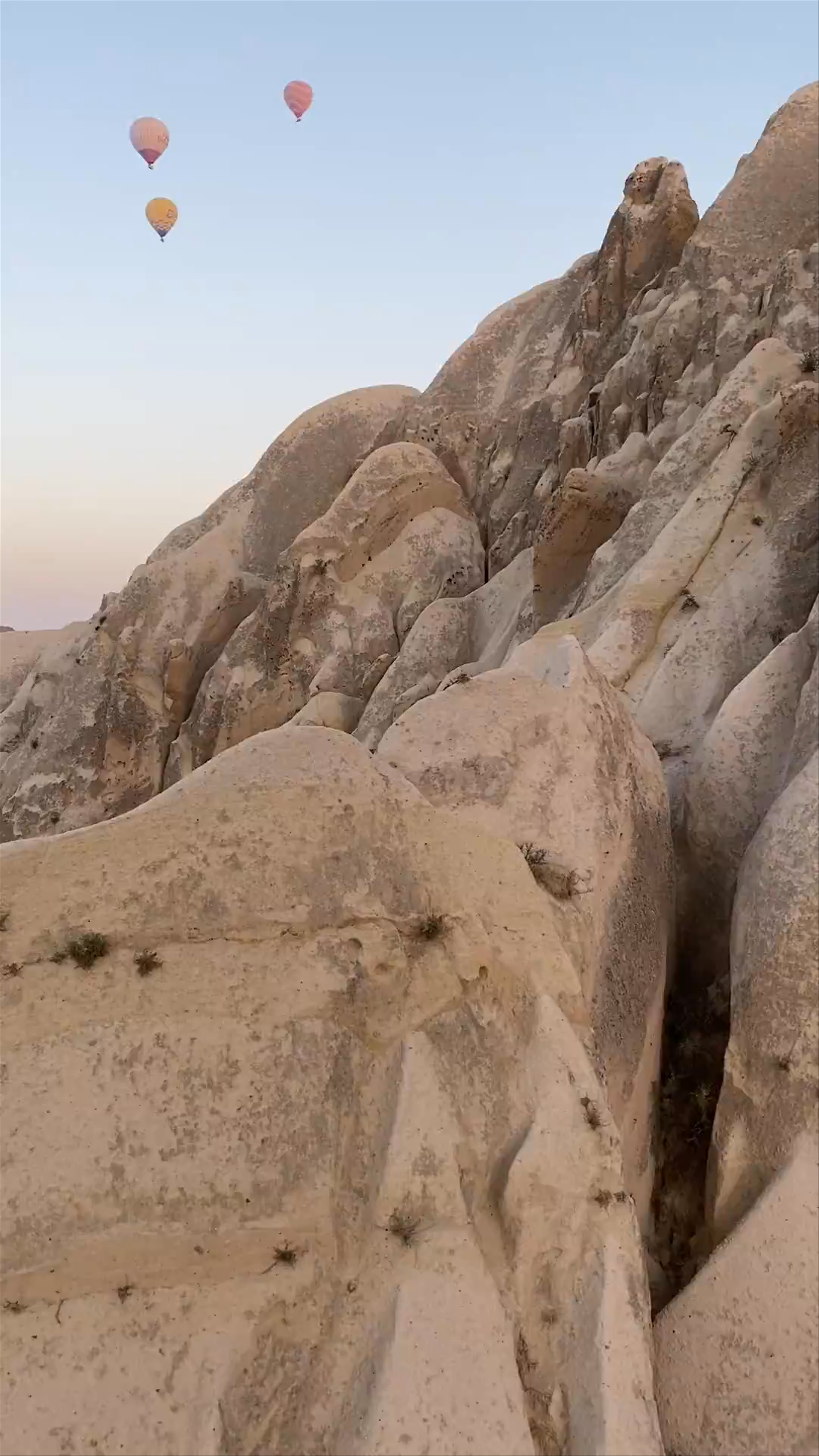Sunrise Balloons Over the Enchanting Red Valley in Cappadocia