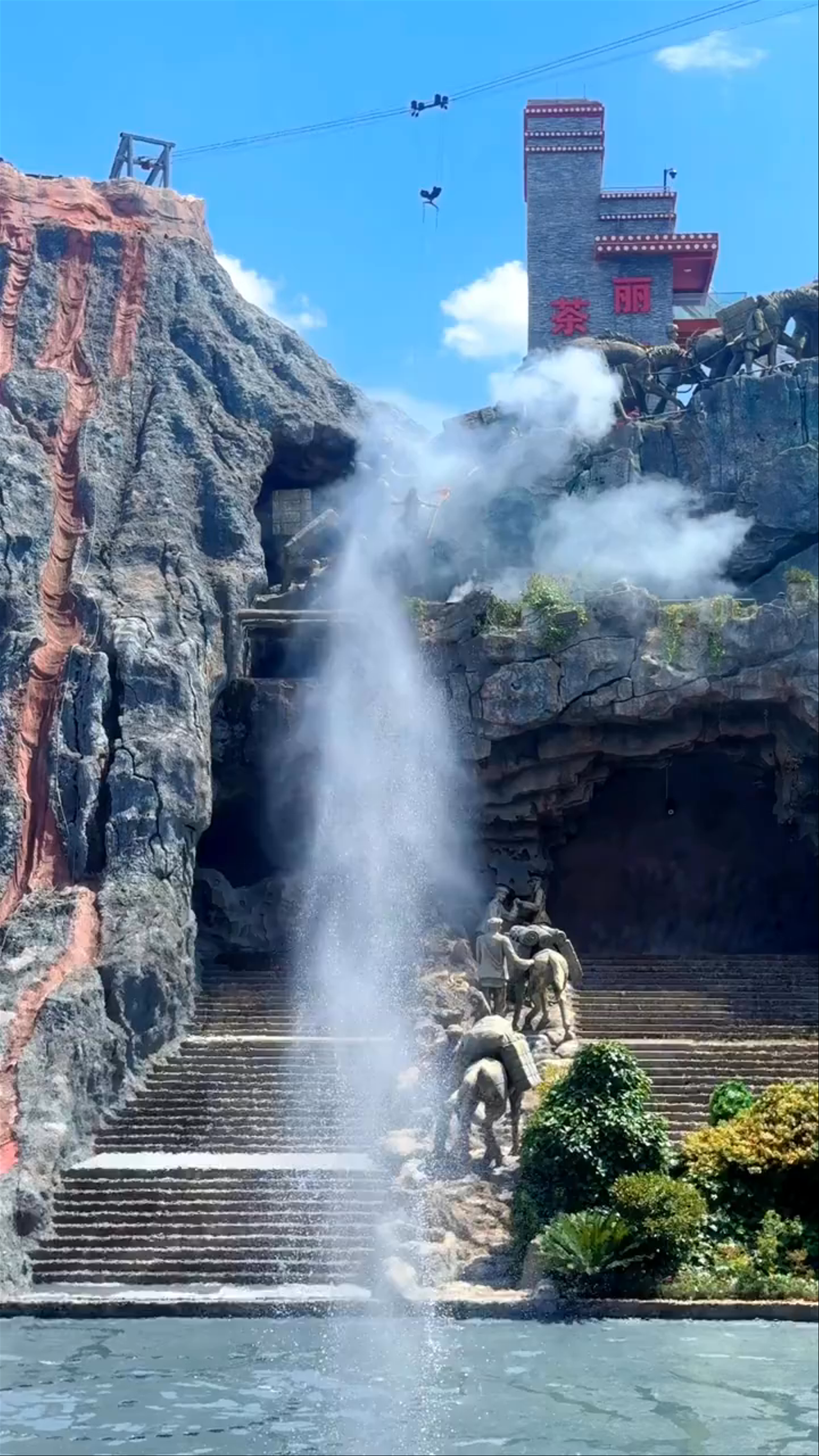 Majestic Waterfall and Ancient Sculptures at Songcheng Lijiang Qian Guqing Theme Park