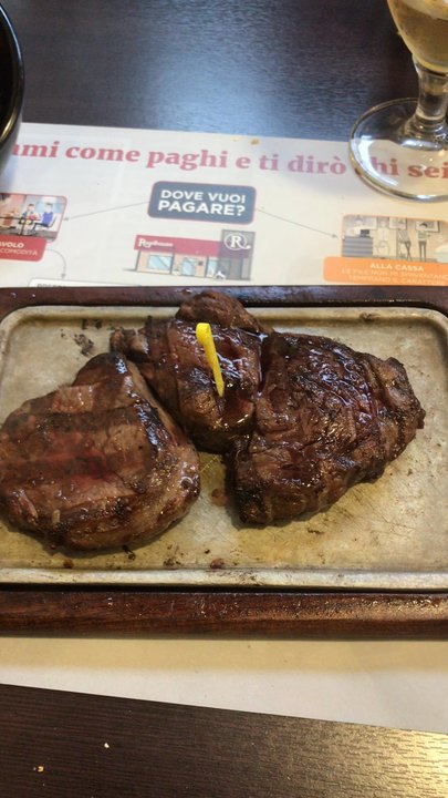 Roadhouse Grill - Rib eye steak and onion rings - Steakhouses Near Me - Rome, RM