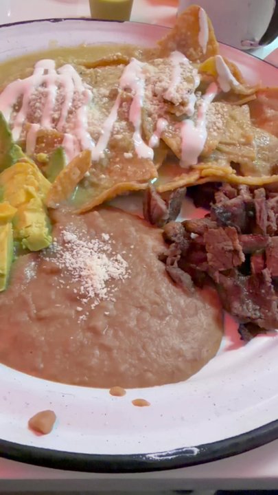 Los Primos Tacos & More - Chilaquiles verde. Great sauce. I forgot to ask them for eggs. Overall i give it 9/10 - Food Delivery Services Near Me - Dallas, Texas
