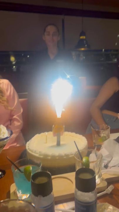 Red Lobster - Our server standing behind the cake, she's a doll!! - Seafood Near Me - Tucson, Arizona