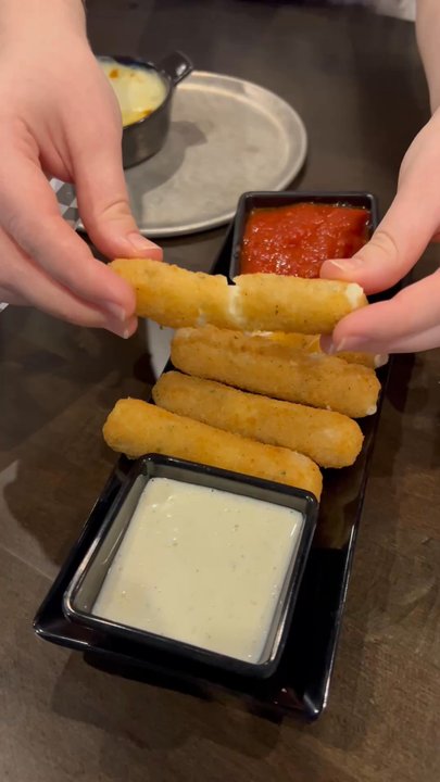 X Golf - Mozzarella stick cheese pull! - Golf Lessons Near Me - Frisco, Texas
