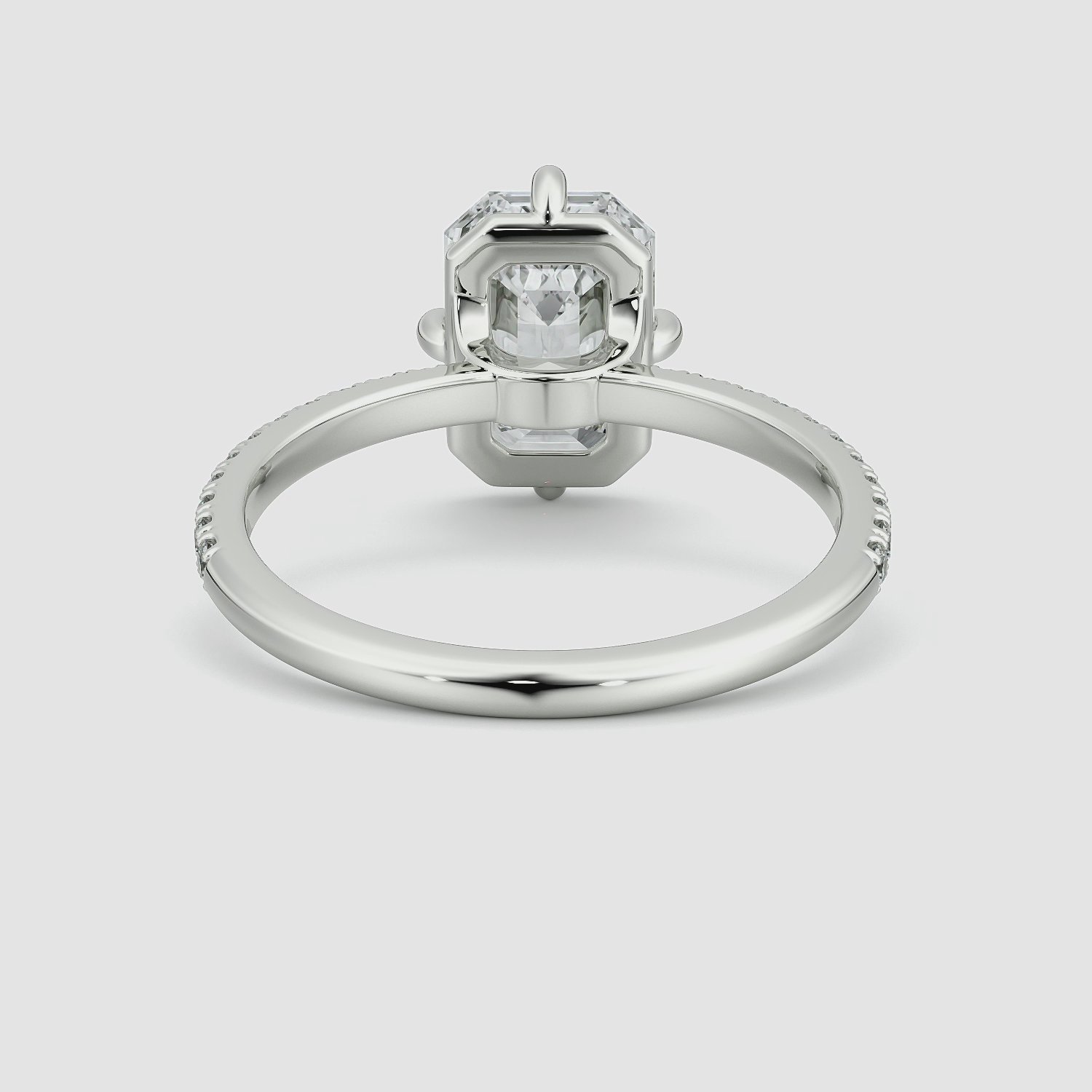 The Compass Solitaire | Emerald | Platinum | bandAccent: Pavé | diamondOrientation: vertical | caratWeight: other