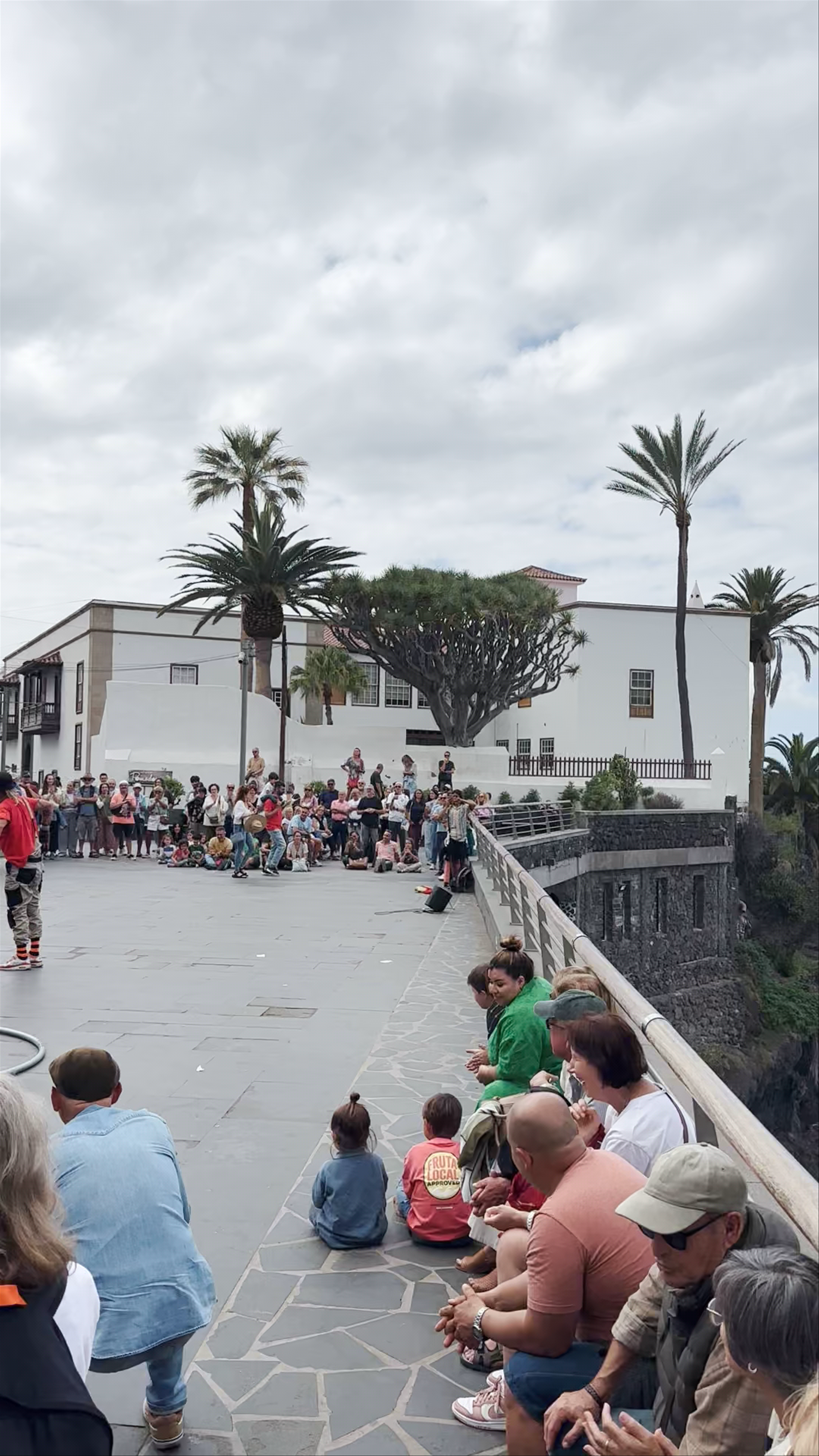 Street Performer Captivates Crowd at Mirador de la Punta del Viento, Puerto de la Cruz