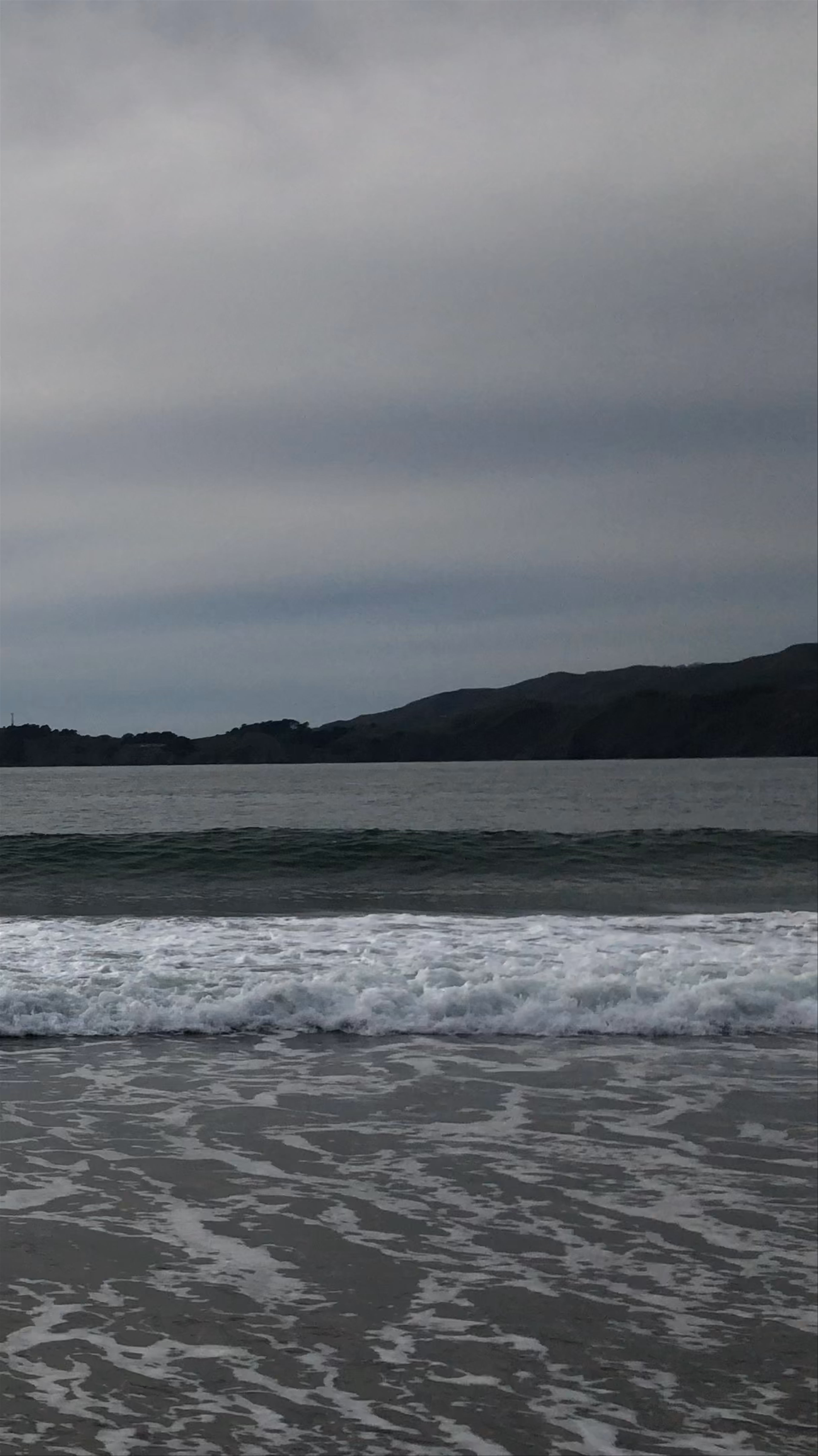 Misty Waves and Coastal Serenity at Baker Beach, San Francisco