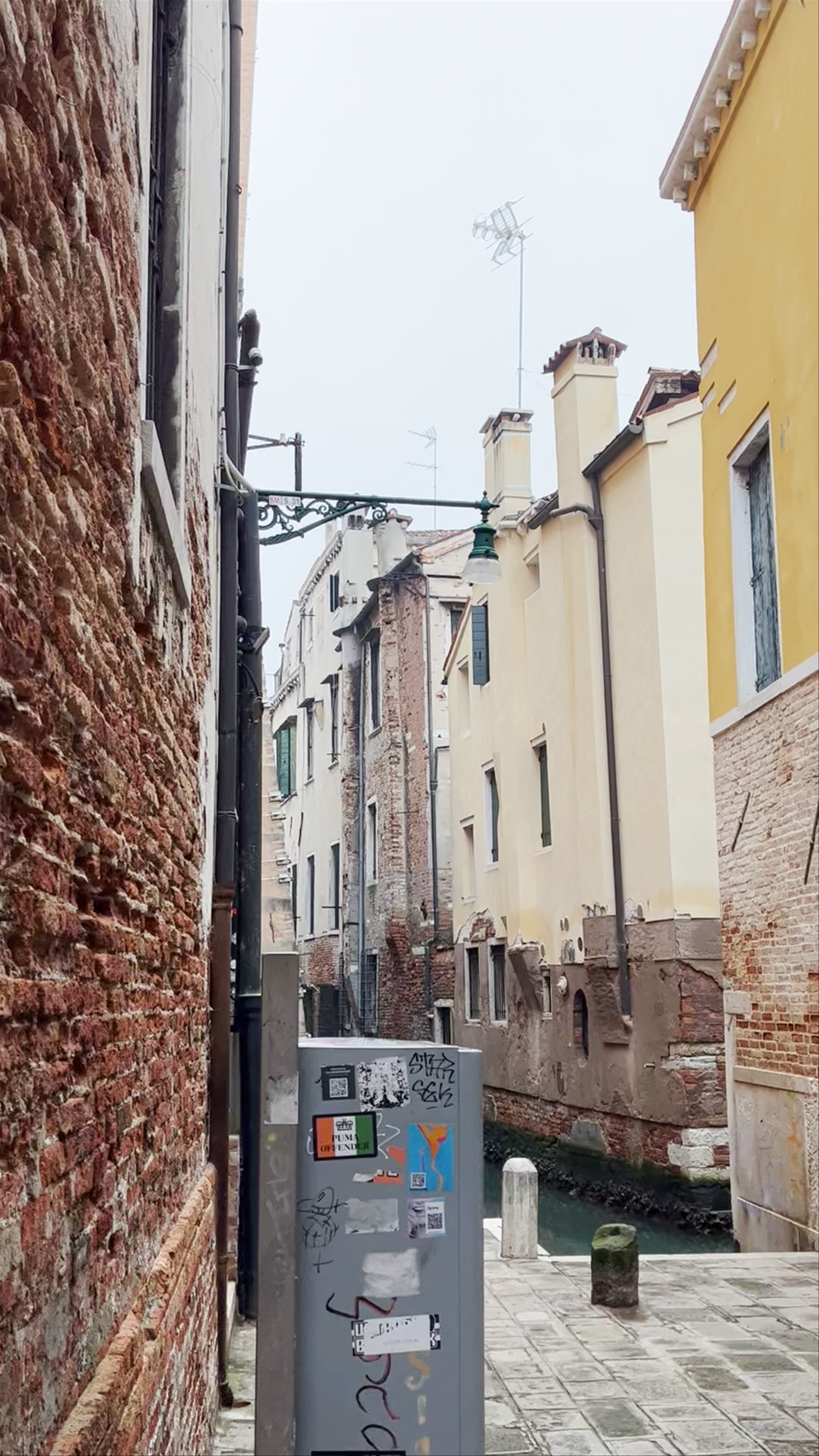Quiet Canal Alley with Historic Charm in Venice