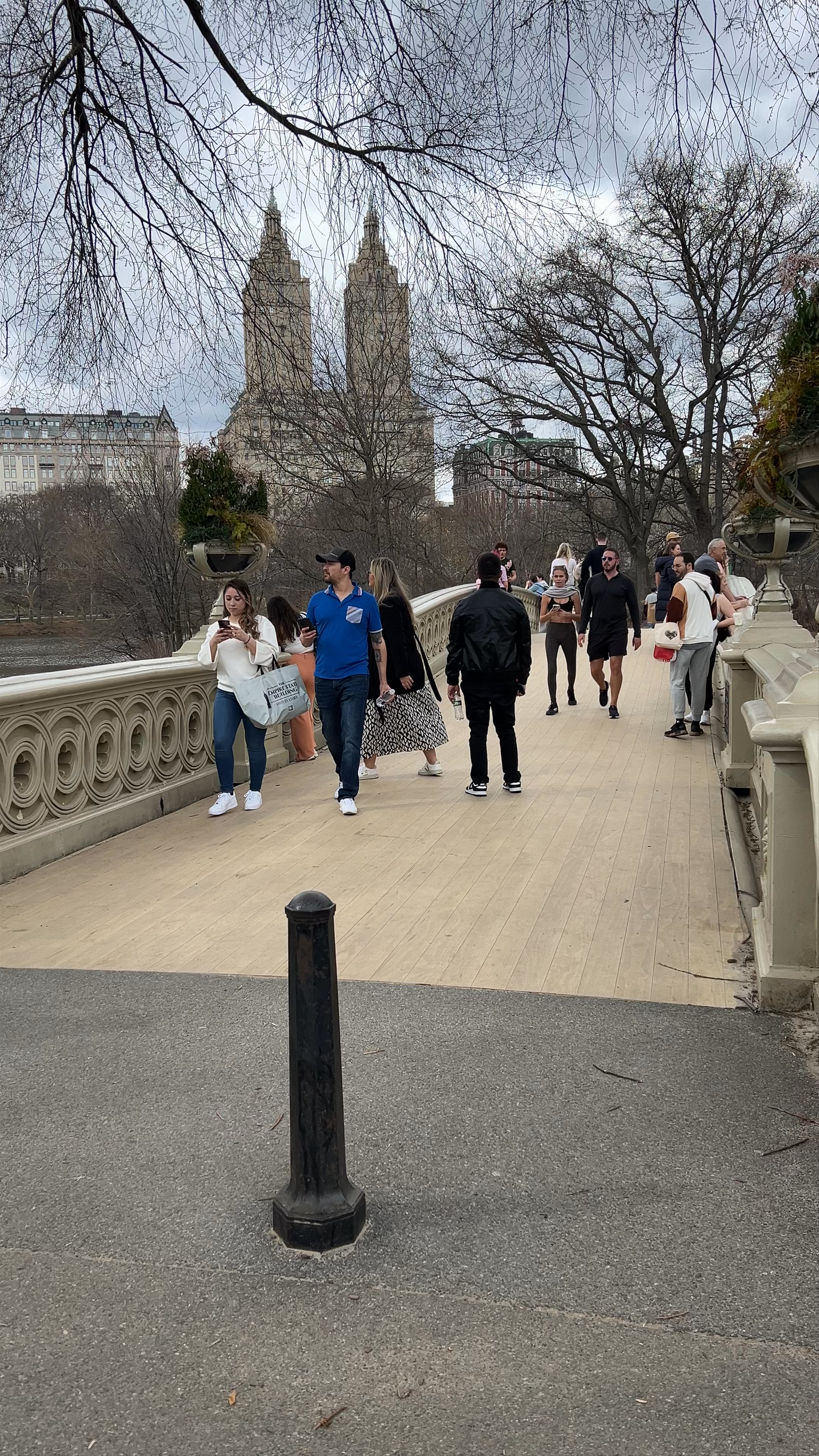 Walking Across Bow Bridge in Central Park, New York