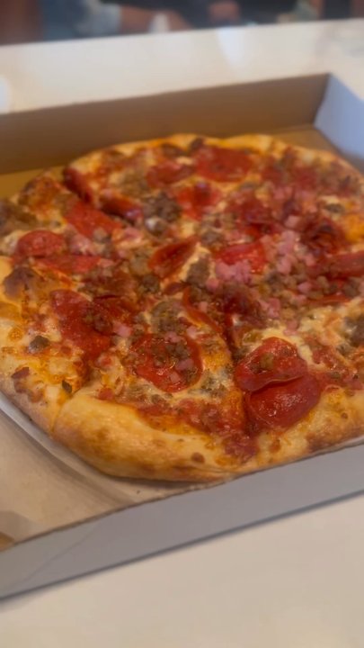 Pizzeria Delphina - Meat lover's medium pizza - Pizza Near Me - Mobile, Alabama