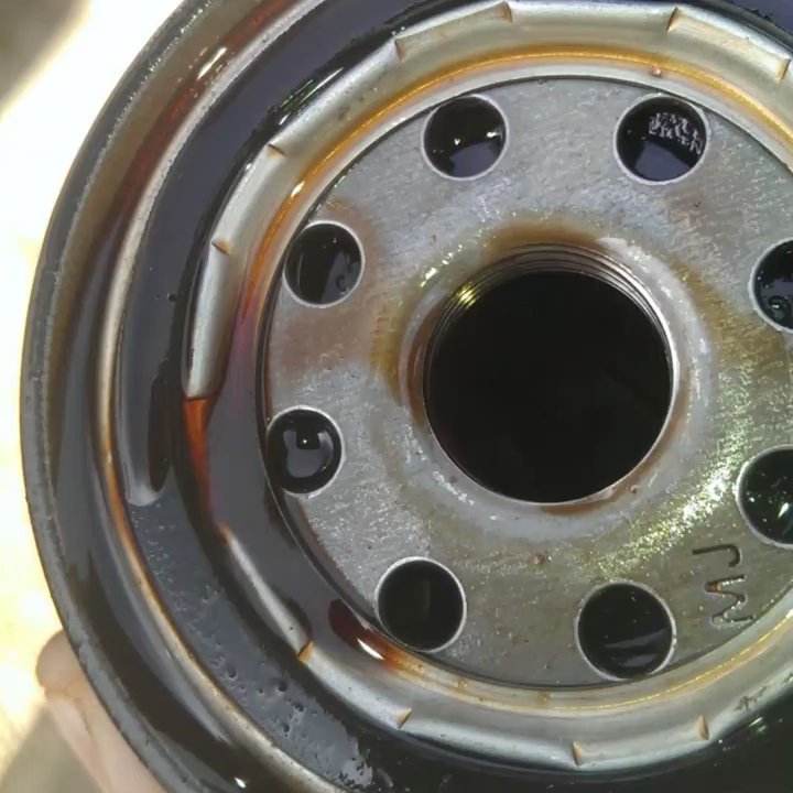 AAMCO Transmissions & Total Car Care - Red in my motor oil little strang - Auto Repair Near Me - Riverside, California