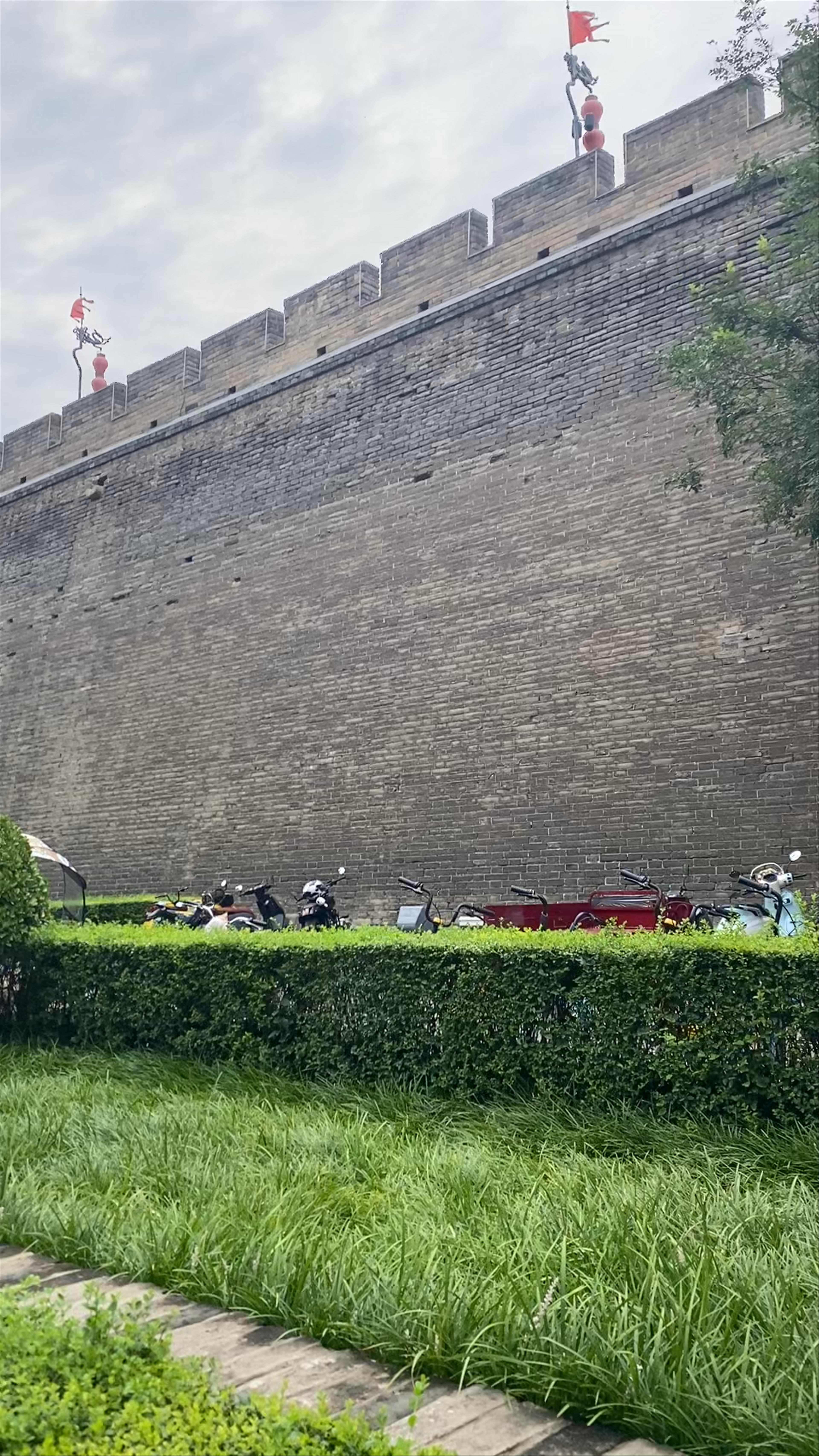 Historic South Gate Wall and Lush Walkway in Xi'an, China