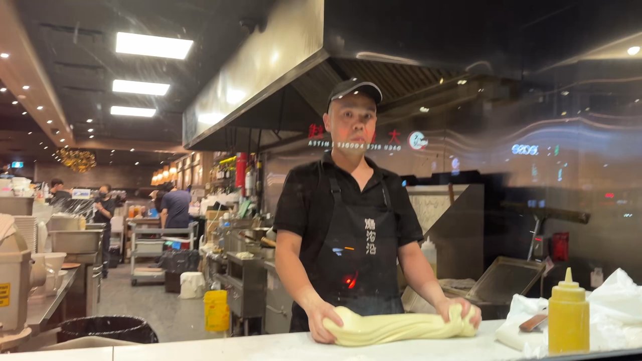 Mogouyan Hand-Pulled Noodles - Noodle man doing his thing in the window - Noodles Near Me - Toronto, Ontario