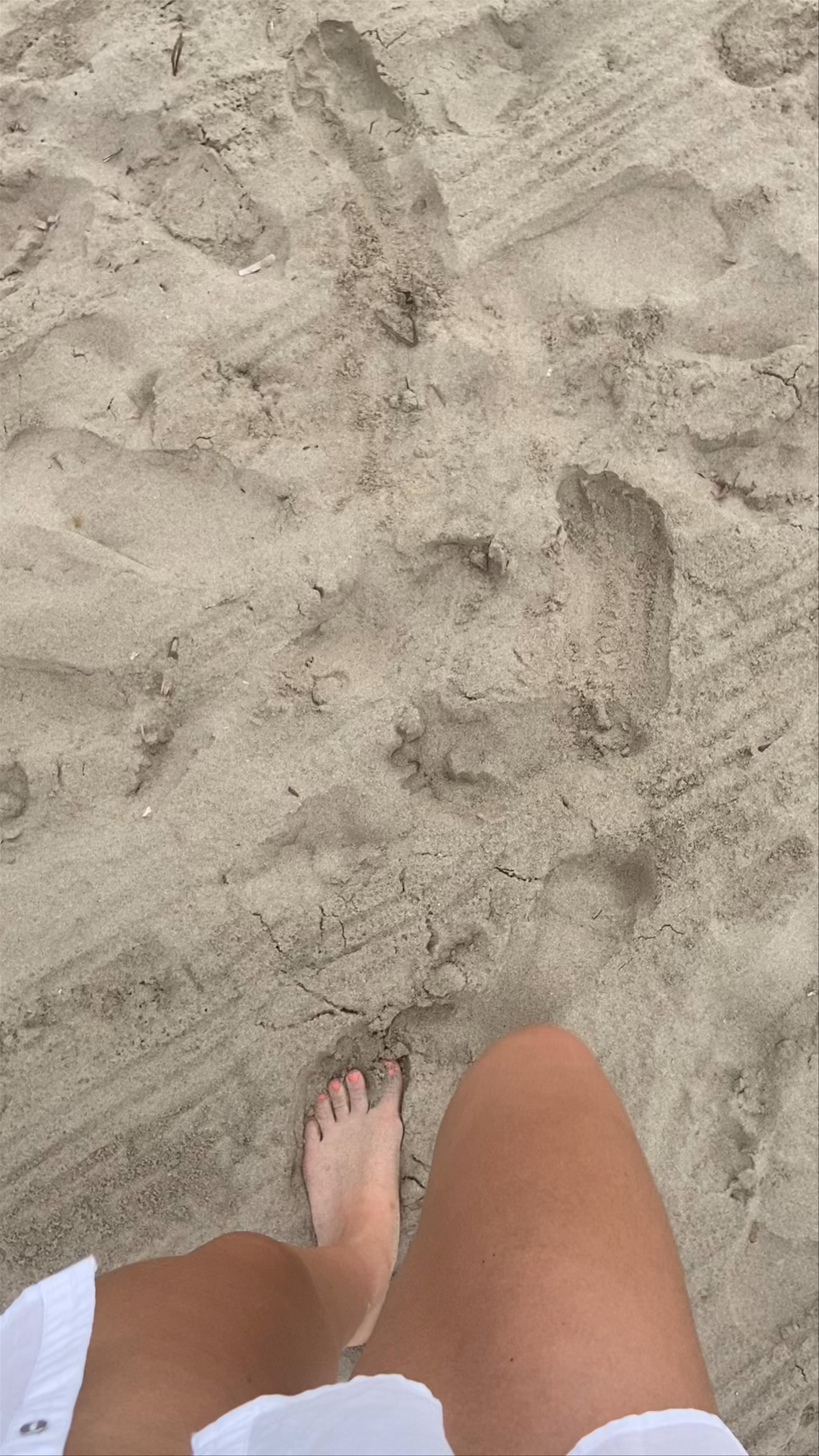 Ushuaia Ibiza Beach Vibes: Relaxing Sand and Overcast Skies