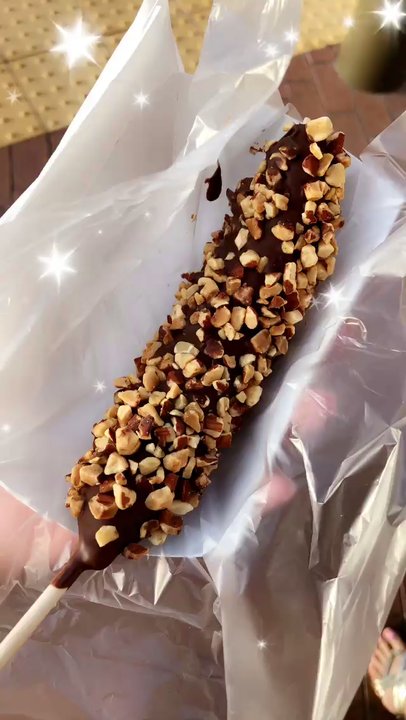 Rocky Mountain Chocolate Factory, Citadel Outlets - Chocolate Dipped Banana w/ Crushed Almonds - Chocolatiers & Shops Near Me - Commerce, California