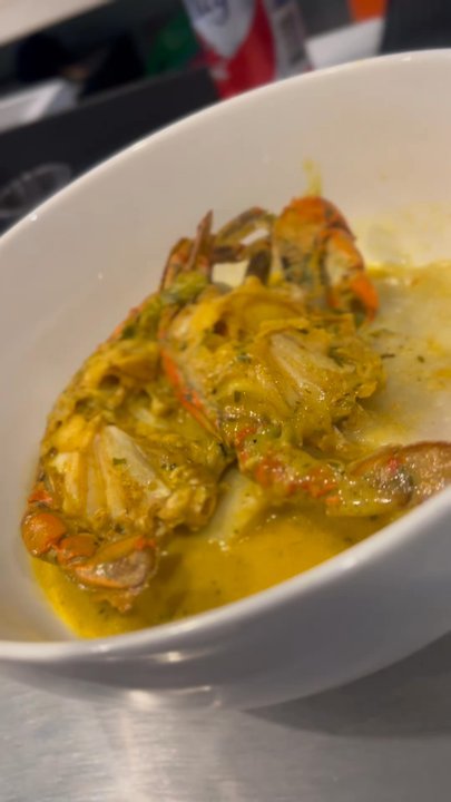 The Ariapita - Curry crab and dumplings - Trinidadian Near Me - Brooklyn, New York