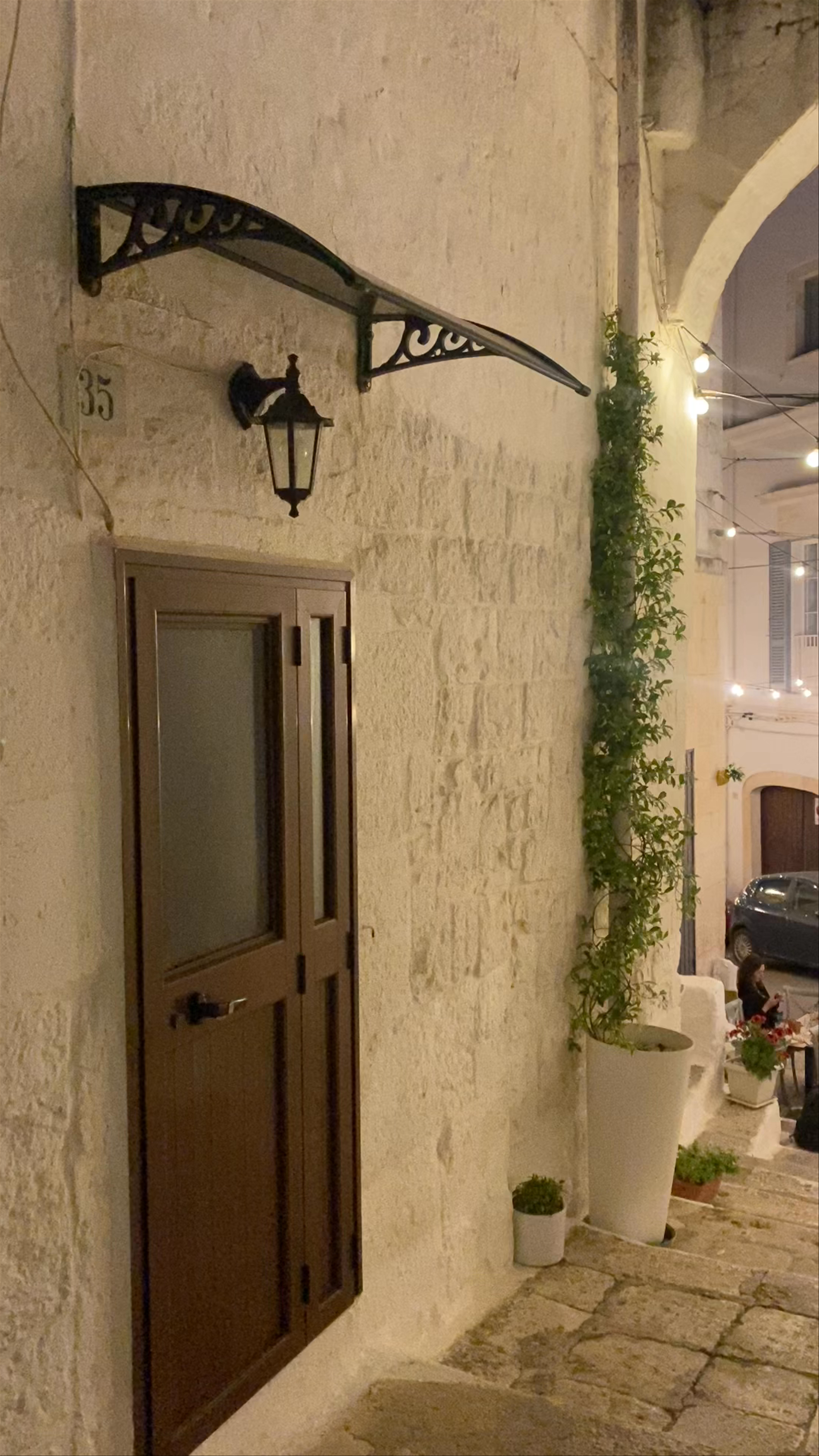Evening Vibes in Ostuni: Charming Alleyway Dining in Puglia, Italy