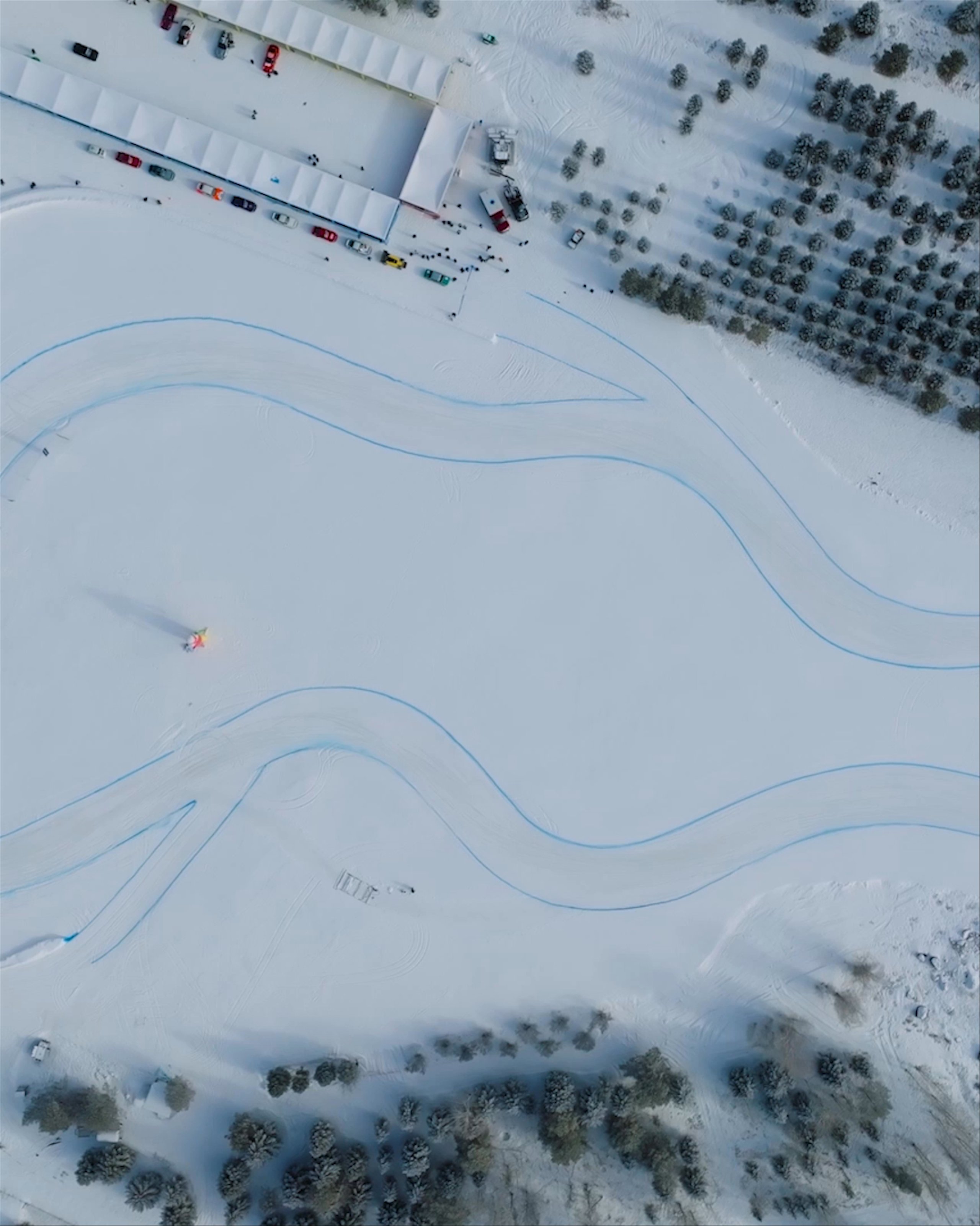 Aerial view of F.A.T. ice race course with cars driving on it