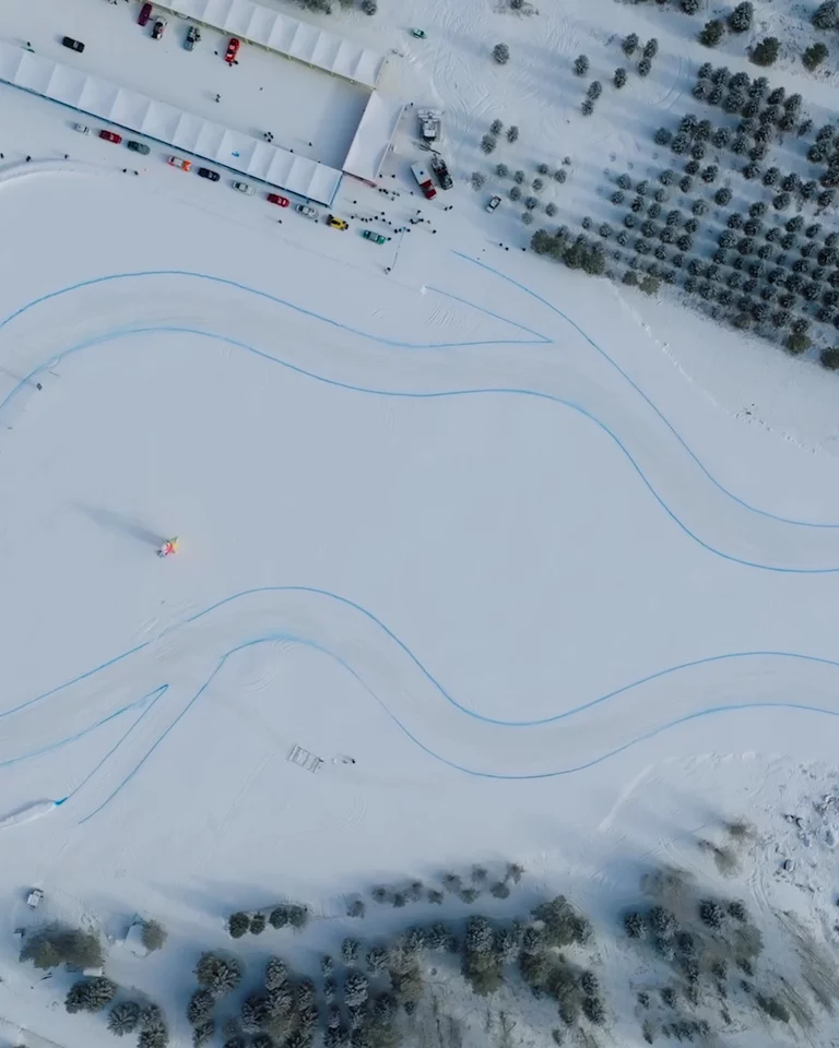 Aerial view of F.A.T. ice race course with cars driving on it