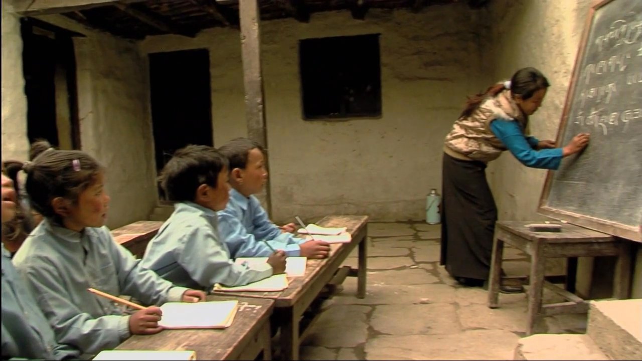 The Dalai Lama discusses the importance of integrating modern education while preserving cultural traditions, illustrated by children learning in a Himalayan classroom.