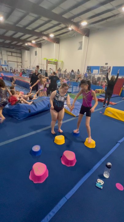 Maggies Be Cafe - Maggie helping another gymnast! - Cafes Near Me - Hudsonville, Michigan