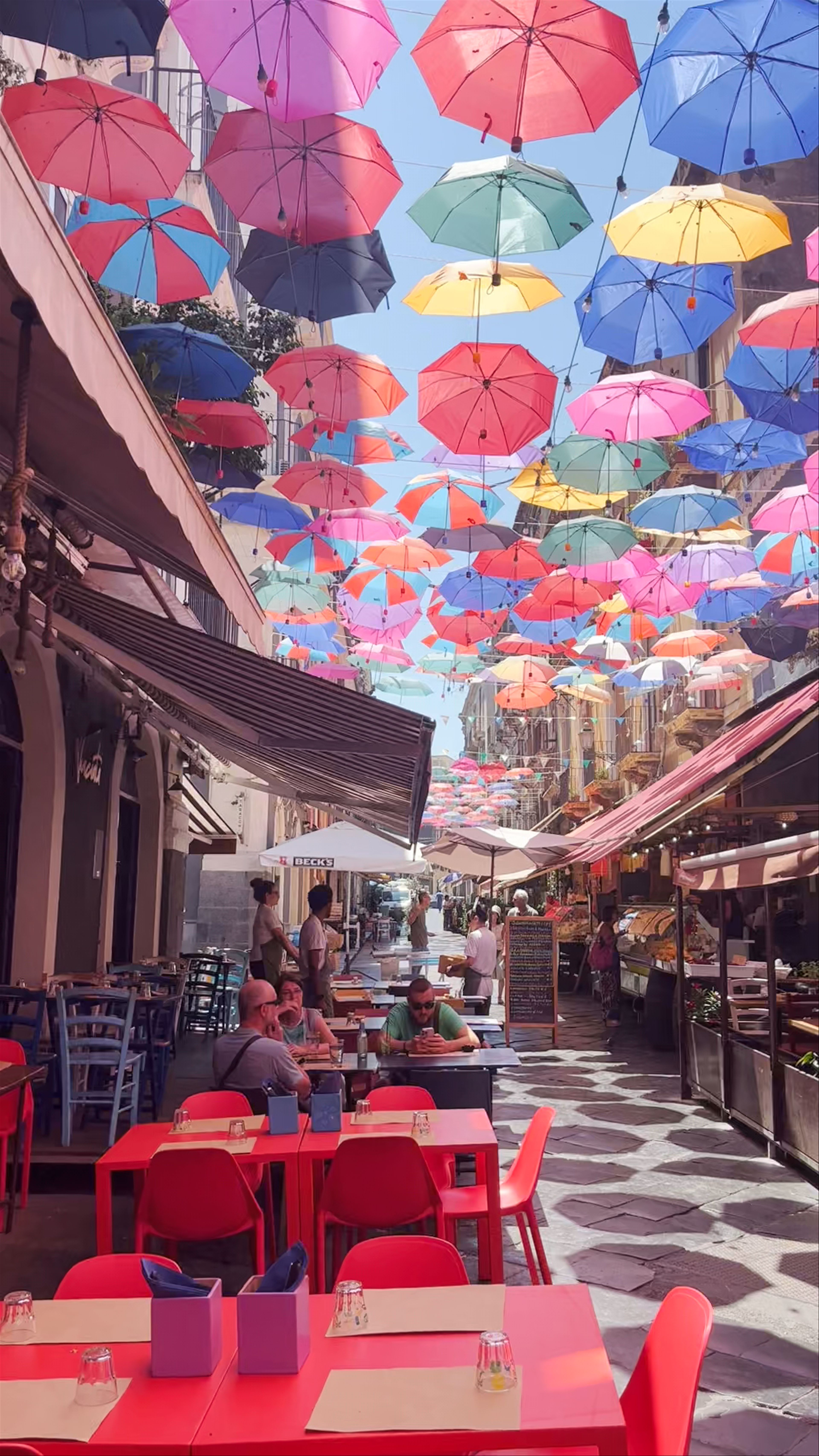 Vibrant Umbrella Canopy at Piazza Duomo, Catania