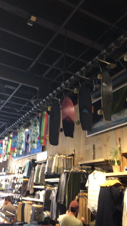 Quiksilver / Roxy - Skateboards hanging from the ceiling assembly line style. Very cool - Swimwear Near Me - Irvine, California