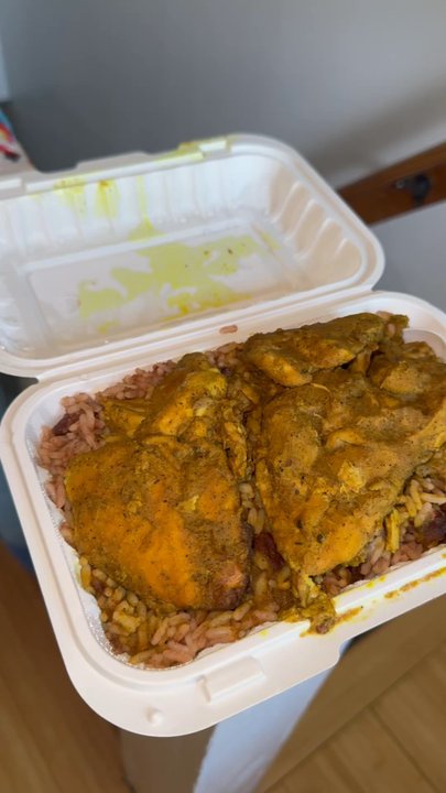 Jerk King - Rice and peas + curry chicken. Good portion though.  Coleslaw is basic. Very egg taste if you don't like that get a different side. - Caribbean Near Me - Toronto, Ontario