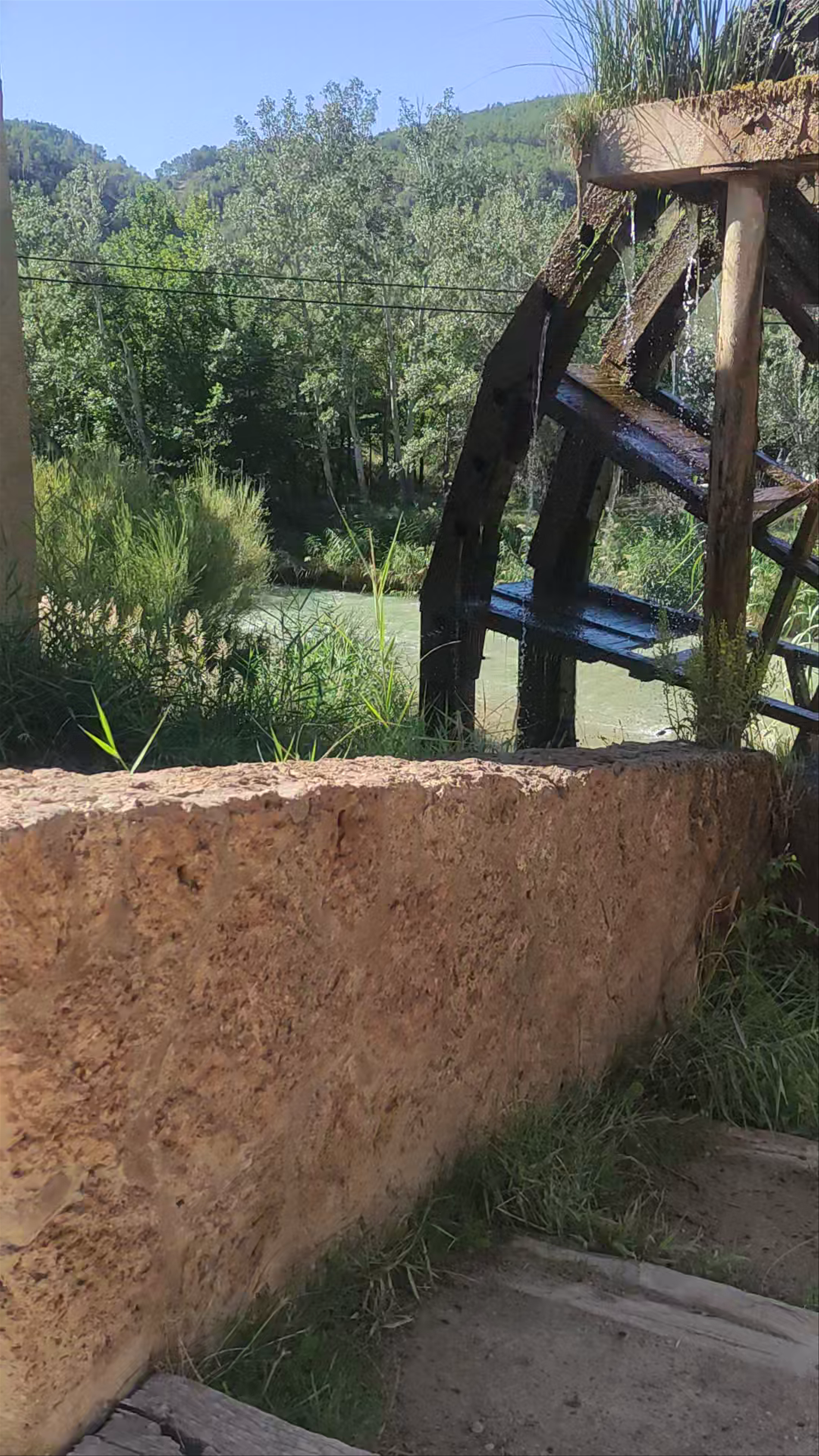 Historic Hydraulic Waterwheel and Bathing Area in Casas del Río, Spain