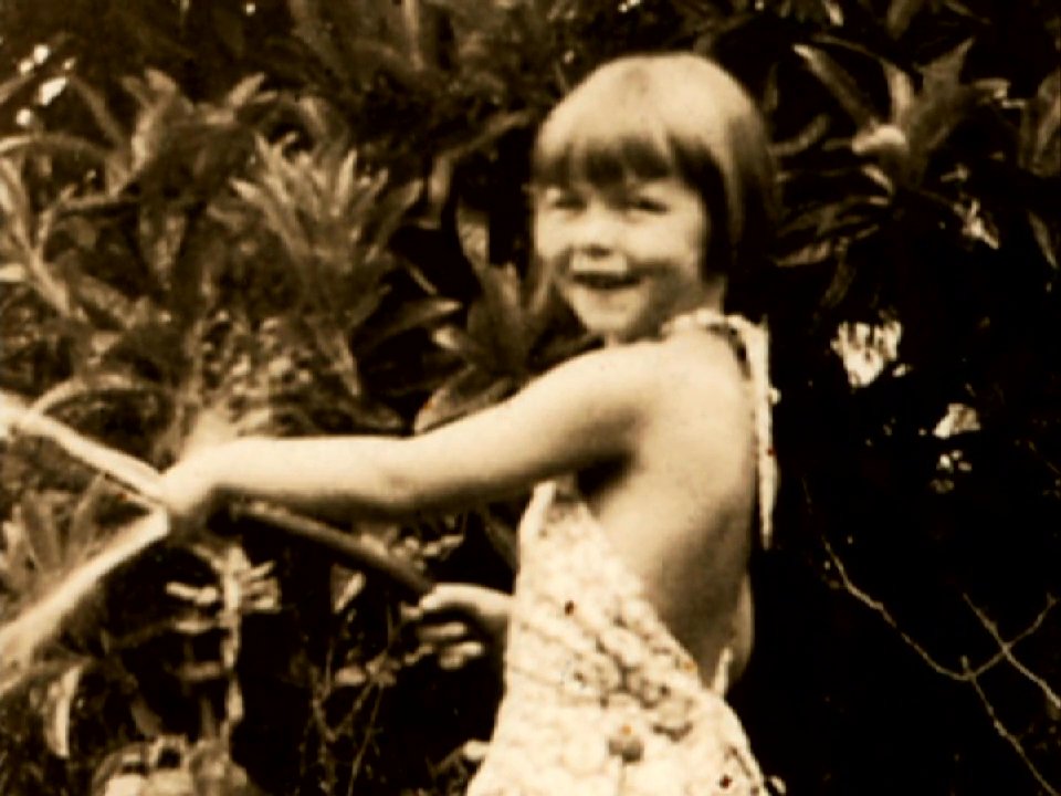 An elderly man reflects on his life, transitioning from nostalgic vintage images of a young girl to his present-day narration. The sequence captures a poignant connection between past memories and current experience.