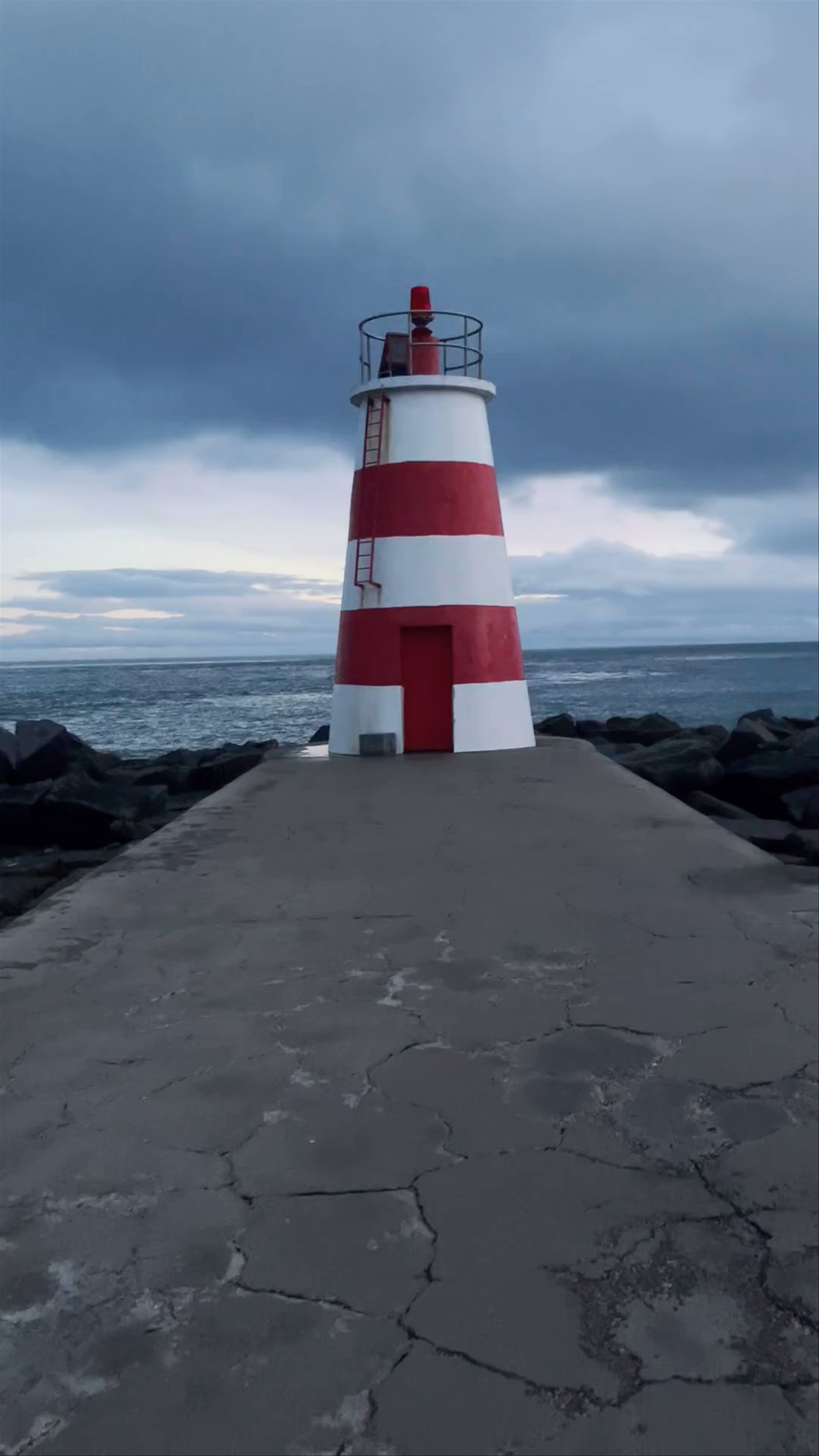 Misty Evening at the Red & White Lighthouse in Portimão