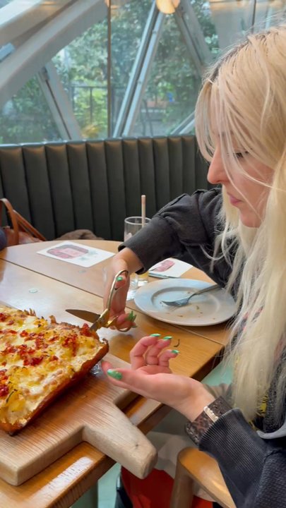 Willmott's Ghost - First time cutting pizza w/ scissors lol - Italian Near Me - Seattle, Washington