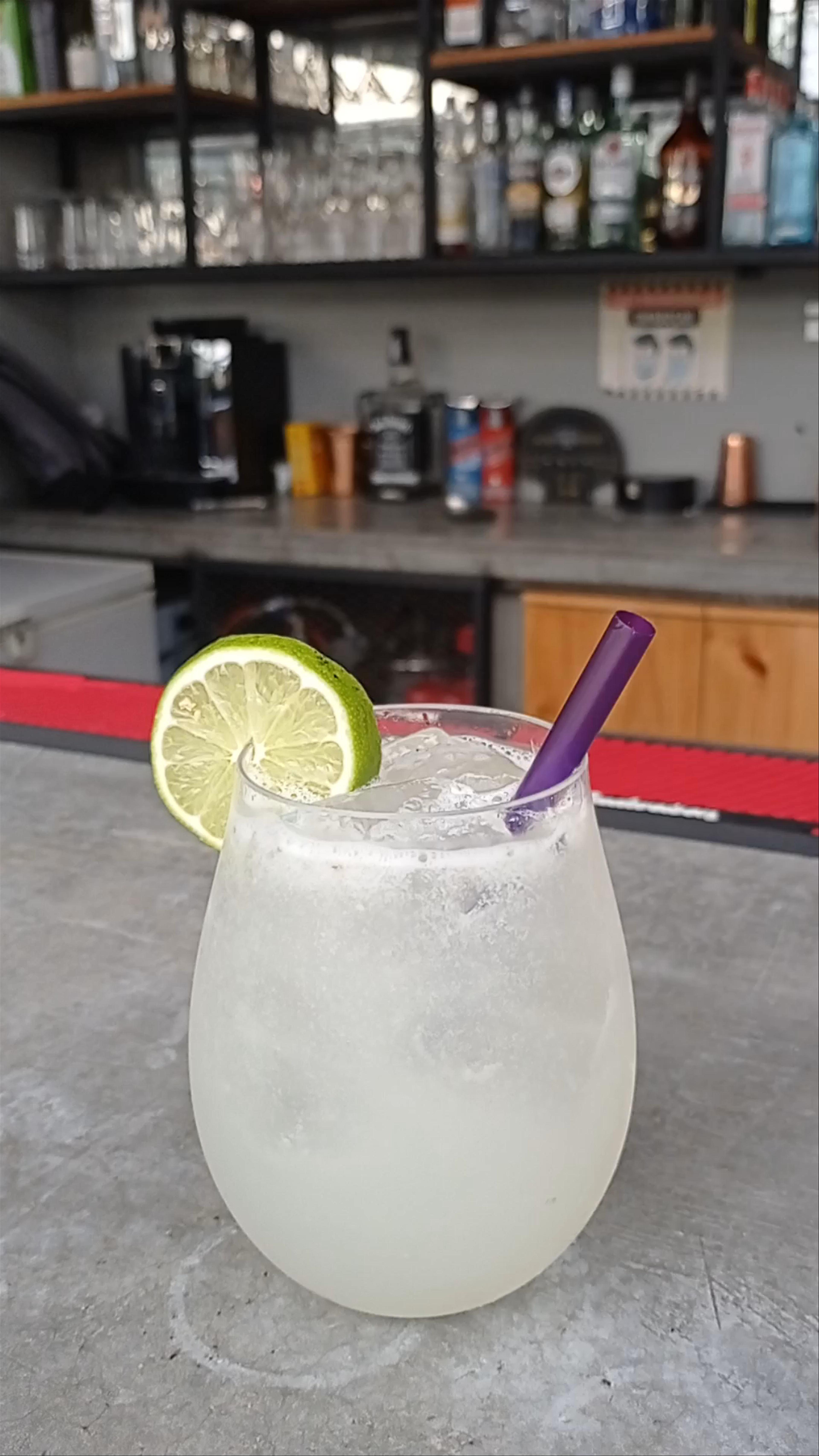 Chill Poolside Vibes with Refreshing Lime Drink at Medellín Vibes Hostel